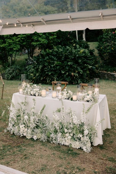 Kualoa Ranch Paliku Gardens Hawaii Wedding by Oahu Wedding Photographer Desiree Leilani Wedding Ceremony Centerpieces, Tropical White Flowers Wedding, Greenery Flowers Wedding, Wedding Reception Table Florals, Bridal Table Arrangement, Sweetheart Table Wedding Florals, Reception Decor Wedding, Garden Party Sweetheart Table, Wedding Flower Reception