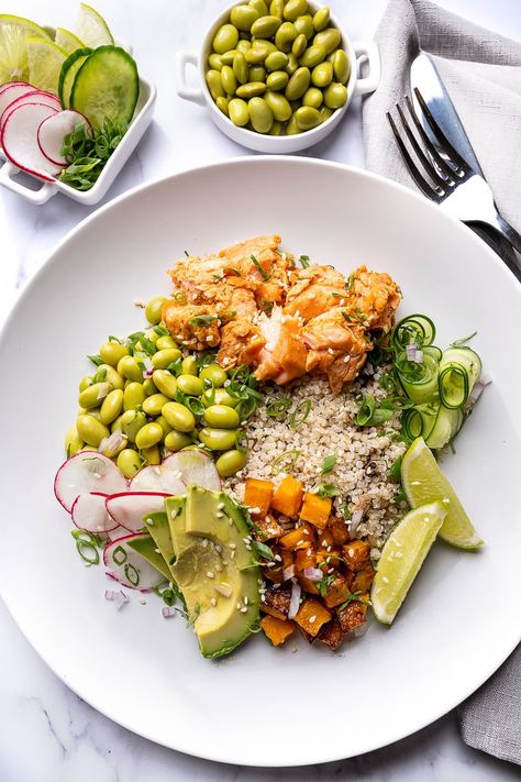 October is International Seafood Month, and we're feeling inspired! ✨ Here's a new recipe for you to try at home - Smoked Salmon Poke Bowl with Butternut Squash & Quinoa. 😋🐟​ Ingredients:​ 1 cup cooked quinoa​ 1/2 lb smoked salmon, diced​ 1 cup roasted butternut squash cubes​ 1/2 avocado, sliced​ 1/4 cup edamame​ Pickled ginger​ Radishes, thinly sliced​ Sesame seeds​ Soy sauce, sesame oil, and lime juice for dressing​ Microgreens for garnish​ Happy cooking! Roasted Butternut Squash Cubes, Salmon Poke Bowl, Squash Quinoa, Butternut Squash Quinoa, Butternut Squash Cubes, Salmon Poke, Cooked Quinoa, Salmon Bowl, Pickled Ginger