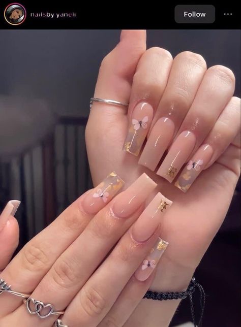 Simple Nails Graduation, Nails Acrylic Nude Color Design, Nude Nail Inspo Acrylic, Nude Gold Acrylic Nails, Nude Nails With Butterflies, Nude With Gold Nails, Clear Nude Acrylic Nails, Nail Ideas With Butterflies, Gel Nails Butterfly