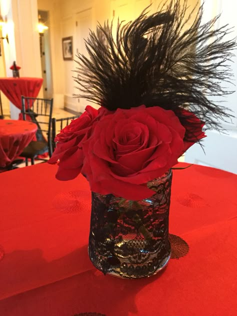 Even our tiny vases featured black lace and feathers! Moulin Rouge inspired party Red And Black Formal Party Decorations, Moulin Rouge Gala Theme, Red And Black 60th Birthday Ideas, Burlesque Party Ideas, Leather And Lace Party Theme, Tango Party Decorations, Moulin Rouge Prom, Moulin Rouge Centerpieces, Moulin Rouge Theme Party Decoration