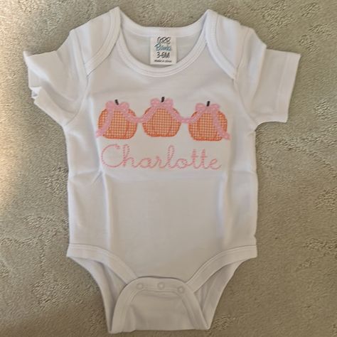 Brand New Embroidered Onesie With Gingham Bow Pumpkins. Embroidery In Pink, Pumpkins In Orange. For “Charlotte” But Forgot To Gift Before She Got Too Big! So Cute For A Little Girl Before Halloween This October Pumpkins Embroidery, Embroidered Onesie, Fall Embroidery, Pink Pumpkins, Month Colors, Girl Falling, Big Kids, 6 Months, Pumpkins