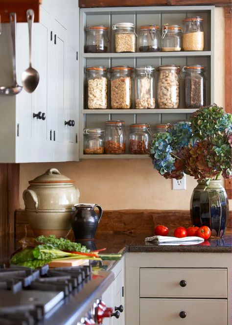 The Italian Grandmother Aesthetic Is the Perfect Elegant-Meets-Rustic Look Italian Home Aesthetic, Rustic Italian Kitchen, Italian Country Kitchen, Rustic Kitchen Cabinet, Glass Upper Cabinets, Italian Apartment, Grandmother Aesthetic, Yellow Cabinets, Kitchen Cabinet Ideas