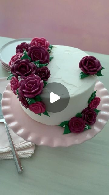 Wilton Cake Decorating on Instagram: "Here’s how to make gorgeous buttercream roses to adorn your cakes and cupcakes using a flower nail and Petal Cake Decorating Tip 104 🌹🧁   Who else loves a classic flower technique on their cakes? 🙋‍♀️   #WiltonCakes #CakeDecorating #CakesOfInstagram #CakeDecoratingReels #ButtercreamFrosting #CakeCakeCake #CakeDecoratingForBeginners #EasyCakeDecorating #EasyCakeDesign #CakeDecoratingIdeas #CakeDecoratingVideos #SpringDesserts" Rose Decorated Cake, Piping Flowers On Cake, Petal Cake, Piping Flowers, Buttercream Roses, Cake Piping, Cake Decorating For Beginners, Wilton Cake Decorating, Simple Cake Designs