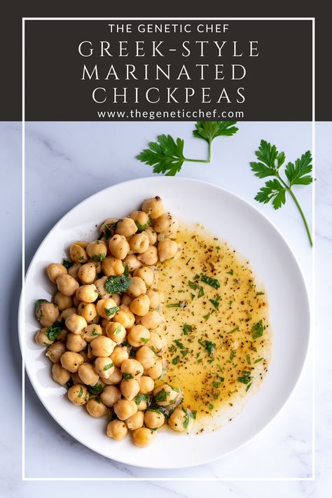 Greek-Style marinated chickpeas are prepared in minutes then left to allow the flavors to marry and form a match made in heaven. Pile it on a cracker, salad, sandwich, or eat as is. You can also blend it for a delicious spread. #chickpeas #salads #sides #Greekchickpeas #whole30recipes | @thegeneticchef Greek Chickpea Recipes, Chickpea Seasoning Recipes, Mediterranean Chickpeas, Greek Garbanzo Beans, Greek Chick Pea Salad, Marinated Chickpeas Recipe, Marinated Chickpea Recipes, Chickpea Greek Salad, Marinated Chickpeas