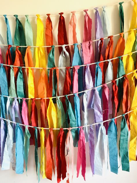 Fabric tassel bunting. Bestseller.  Pretty, 100% environmentally friendly and the cheapest in the market.  Made from recycled materials. Handmade to order. 100%  environmentally friendly. Generous 25 cm drop. Made from cotton fabrics and cotton rope. . 4cm gap between tassels. Washable. Reusable. Easy to store.  Bulk discounts available. Any colour combo available. ( just message me. I love love love a quirky custom order!) Suitable for indoor and outdoor. Perfect for attaching lights for extra Boho Backyard Party Decor, Summer Solstice Decor, Handmade Party Decorations, Summer Solstice Party Decorations, Festival Themed Party Decorations, Festival Decorations Outdoor, Funky Christmas Decor, Whimsical Party Decor, Tassel Garland Decor