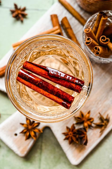 This easy homemade Cinnamon Simple Syrup is perfect for adding to cocktails, coffee and so much more. You only need 3 ingredients and 5 minutes of hands on work to make a big batch that will last for weeks. Cinnamon Simple Syrup, Vegan Eggnog, Crowded Kitchen, Cinnamon Syrup, Cocktail Syrups, Winter Cocktails, Flavored Syrup, Baked Oats, Syrup Recipe