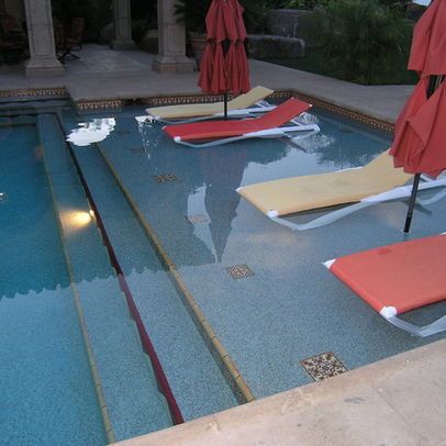 tanning ledge with umbrella holes; tiles in floor; steps down; ledge Ideas De Piscina, Unique Pool, Mediterranean Pool, Small Inground Pool, Pool Design Ideas, Cheap Pool, Tanning Ledges, Pool Remodel, Backyard Pools