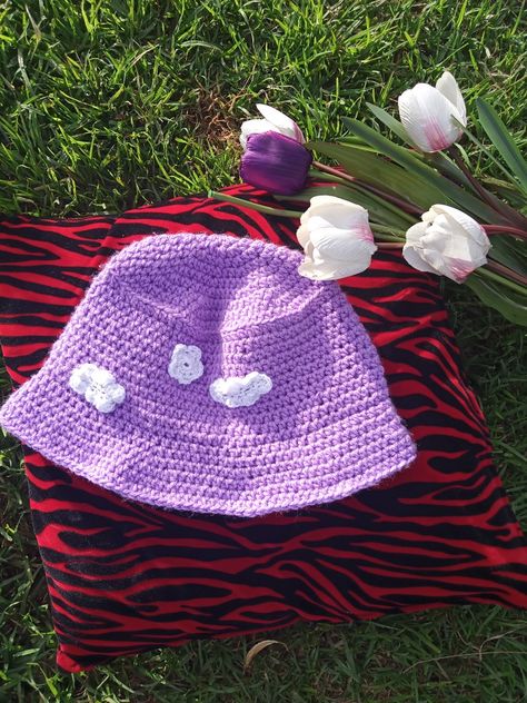 Purple crochet bucket hat with cloud accessories Purple Crochet Bucket Hat, Bucket Hat Ideas, Purple Bucket Hat, Bucket Cap, Purple Hats, Crochet Bucket Hat, Beginner Crochet Projects, Hat Ideas, Crochet For Beginners