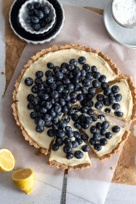 This homemade Blueberry Mascarpone Tart is fresh tasting, creamy and incredibly delicious! The easy olive oil crust comes together in minutes and is topped with a rich lemon and vanilla mascarpone filling and lots of in season berries. Blueberry Mascarpone, Mascarpone Tart, Mascarpone Filling, Cream Pie Filling, Milk Chocolate Chip Cookies, Blueberry Tart, Fruit Toppings, Banana Cream Pie, Pie Tart