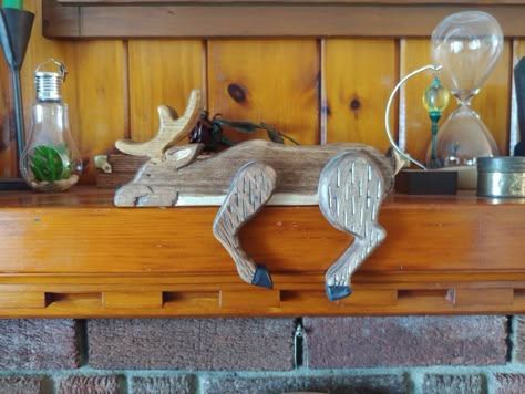 "This shelf sitter is made from pine and is hand carved and stained. 9.5\" long." Shelf Sitters Wooden, Pallet Art Diy, Engraver Ideas, Fall Pallets, Wood Deer, Wooden Deer, Chainsaw Carvings, Wood Yard Art, Wooden Reindeer