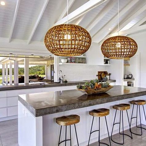 www.pencilshavingsstudio.com  -  Are you noticing the rattan trend happening everywhere lately? I’m particularly keen on rattan pendant lights – there’s something so beachy and fresh about them, and the bell shape feels crisply contemporary with a nod to natural fibers. Check out my roundup of 13 rattan pendants for your home decor project - and several that are budget-friendly too. The Grove Byron Bay, Beach Style Kitchen, Kitchen Glass, Kitchen Farmhouse, Living Magazine, Kitchen Pendants, Trendy Kitchen, Kitchen Window, The Grove