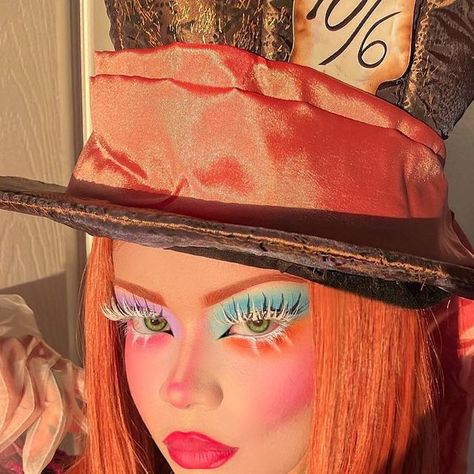 Stenie on Instagram: "We’re all quite mad here! You’ll fit right in …🫖🎩🪞🧡  🌳  Costume @dollskill <3" Mad Hatter Black Woman, Easy Mad Hatter Makeup For Women, Halloween Characters Costumes, Colorful Wig Costume Ideas, Creative Costumes Women, Mad Hatter Makeup For Women, Uncommon Halloween Costumes, Disney Character Costumes, Mad Hatter Costume Female