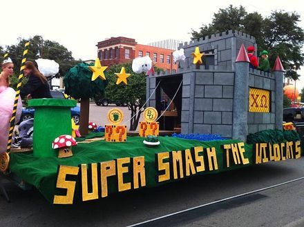 mario Donkey Kong Homecoming Float, Mario Hoco Float, Super Mario Float Ideas, Super Mario Bros Float, Mario Homecoming Float, Mario Parade Float Ideas, Mario Brothers Parade Float, Super Mario Parade Float, Movie Themed Parade Floats