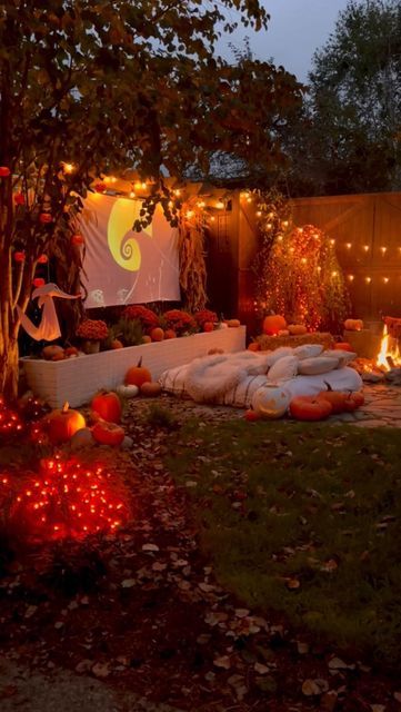 Kara Bowman on Instagram: "What movie should we play for our next movie night? Write your ideas in the comments and tag a friend who you’d invite!

🎃 HALLOWEEN MOVIE NIGHT TIPS:

1. Have plenty of comfy seating and cozy blankets 
2. Make sure to have at least one fire element (firepit, propane fire, candles, lanterns, etc).
3. Set up a large portable screen & outdoor projector 
4. Order pizza and have a popcorn, candy and drink bar
5. Add in fun and festive Halloween touches like orange string lights, pumpkins, mums, skeletons, etc. 

Have fun with it and get creative! Let me know if you have any other ideas that would be fun to add in! 🍿🎥🎃

#halloweenmovienight #outdoormovienight #movienight #movienightathome #halloweendecor #halloweenparty #halloweenpartyideas #halloweenpartydecor #h Halloween Night Movie, Halloween Night Ideas, Halloween Backyard, Garden Cinema, Halloween Movie Night Party, Outdoor Movie Night Party, Backyard Halloween Party, Diy Backyard Movie Night, Outside Movie