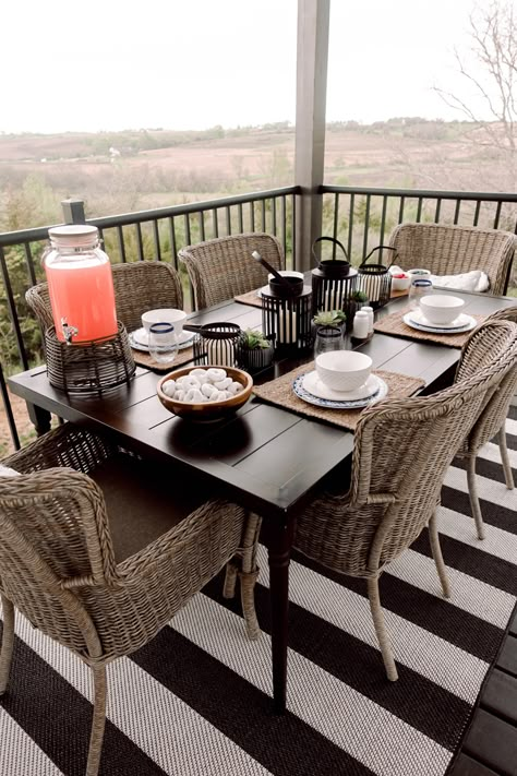 Patio Tables And Chairs, Black Patio Table Decor, Outdoor Centerpieces Patio Dining Tables, Black Patio Table And Chairs, Balcony With Dining Table, Screened Patio Dining Table, Center Piece For Outdoor Dining Table, Outdoor Patio Dinner Table, Deck Table Decor