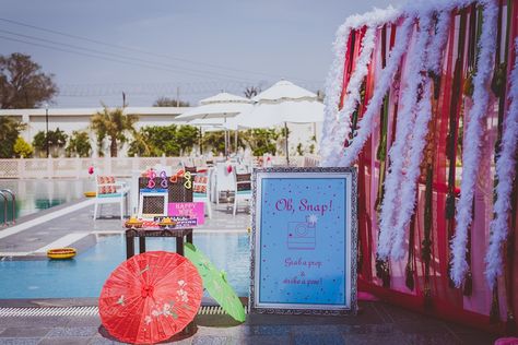 Trending and fun Photobooth ideas for Indian Weddings | Poolside photo booth | Photobooth props | Indian Wedding decor | Colorful parasols | Photobooth backdrop | Credits: Kunal Khanna | Every Indian bride’s Fav. Wedding E-magazine to read. Here for any marriage advice you need | www.wittyvows.com shares things no one tells brides, covers real weddings, ideas, inspirations, design trends and the right vendors, candid photographers etc. Indian Decoration, Photobooth Ideas, Mehendi Ceremony, Indian Marriage, Wedding Mandap, Earrings Sets, Wedding Photo Booth, Indian Wedding Photos, Wedding Sutra