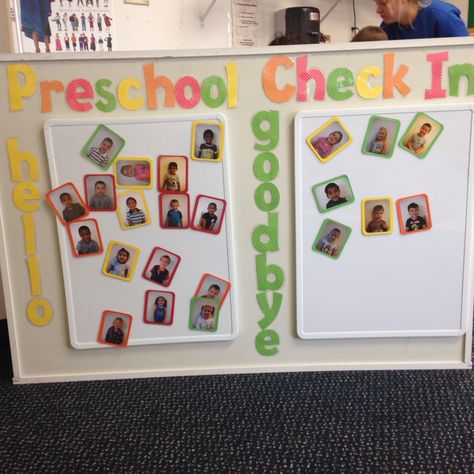 Take a look at this Preschool Classrooms "Sign In and Sign Out Board"  You can find this at our Lansing, MI location! Preschool Teacher Area In Classroom, Attendance Preschool Ideas, Name Check In Preschool, Classroom Check In Attendance, Preschool Check In Board, Check In And Out Board Preschool, Class Sign In Ideas, Attendance Check In Board Classroom, Sign In Charts For Preschool