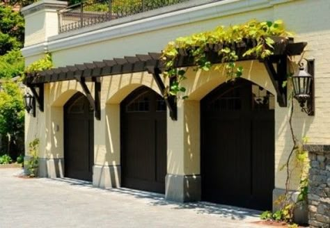 3 car garage with eyebrow pergola with wood door - elegant and understated beauty Eyebrow Pergola, Garage Trellis, Door Pergola, Garage Pergola, Mediterranean Exterior, Patio Pergola, Pergola Lighting, Garage Remodel, Pergola Attached To House