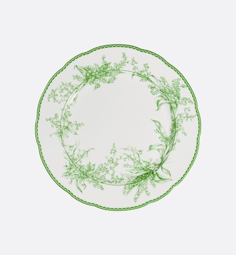 Dinner plate in extra fine Limoges porcelain with green Lily of the Valley motif, revisited for the occasion of the first of May. Lily of the Valley was a good luck charm of Mr. Dior, who always carried a sprig in his pocket for runway shows. Green Lily Of The Valley, Green Lily, Valley Green, Denim Swimsuit, Limoges Porcelain, Christian Dior Couture, Luck Charm, Intellectual Property, Tshirt Skirt