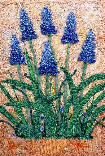 I'm almost finished with Grape Hyacinth-themed art for this year, but I had to try a few new things first.  I played with the complementary colours. I tried this colour combination with the Himalayan Poppies 4 too, and wanted to give it another try: www.flickr.com/photos/bettyclaire/4271376910/  3” x 4 ¼”  9” x 11” framed SOLD www.chursinoff.com/kirsten/ Beading Fabric, Origami Quilt, Grape Hyacinth, French Knot Embroidery, Mini Quilt Patterns, Embroidery Cards, Textile Art Embroidery, Penny Rug, Fabric Cards