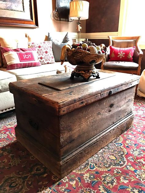 Antique wood trunk or chest used as a coffee table in a living area. Beautiful! Rustic farmhouse style! Chest Trunk Coffee Table, Chest For Coffee Table, Wood Trunk Coffee Table, Living Room Trunk, Antique Chest Coffee Table, Trunk For Coffee Table, Rustic Living Room Coffee Tables, Wood Trunk Ideas, Chest As Coffee Table