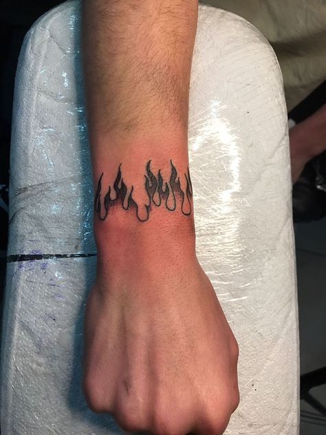 Flames Around Wrist Tattoo, Flame Around Wrist Tattoo, Arm Flame Tattoo, Fire Tattoo Designs Men, Flame Band Tattoo, Fire Wrist Tattoo, Loner Tatoos, Flame Wrist Tattoo, Tattoo Ideas Fire