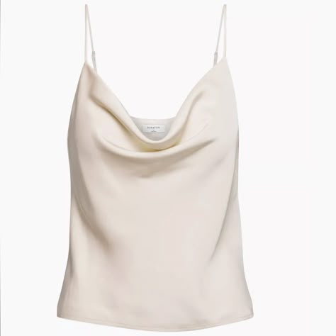 Nwt Babaton Satin Cowlneck Tank In Denude From Aritzia Size Xxs In Perfect Condition! This Is A Cowl-Neck Camisole With Adjustable Straps And A Bias Cut. It’s Made From Luxe, Lightweight Satin From Japan. White Satin Tank Top Outfit, Satin Tank Top Outfit, Aritzia Clothes, Engagement Vibes, Aritzia Top, White Satin Top, Silky Camisole, Linen Camisole, Cowl Neck Shirt