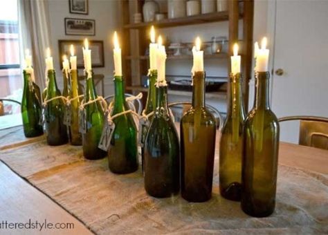 DIY Wine Bottle Candle Holders 217x155 8 Ways to Wow Your Friends with Recycled Wine Bottles Wine Bottle Candle Holders Diy, Bottle Candles Diy, Wine Bottle Candle Holders, Glass Bottle Candles, Candle Holders Diy, Wine Bottle Candle Holder, Wine Bottle Candle, Wine Diy, Bottle Candle Holder