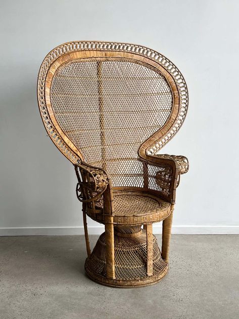 For Sale on 1stDibs - An original example of the iconic “Emmanuelle” peacock chair. The chair features expertly woven wicker and cane with a large-scale fan back, portraying High Back Wicker Chair, Rattan Wingback Chair, Vintage Rattan Chair, Woven Chairs, Rattan Peacock Chair, Office Refresh, Wicker Peacock Chair, Peacock Chairs, Small Sofa Bed