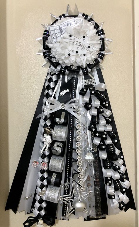 Black White And Silver Homecoming Mums, Senior Mums Homecoming White And Silver, Mum Ribbon Ideas, Mum Ideas Homecoming, Hoco Braids, Freshman Mum, Mum Designs, Garter Homecoming, Homecoming Jeans