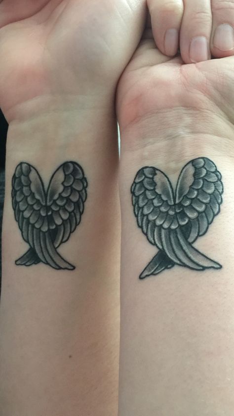 Mother daughter heart angel wing tattoo Angel And Devil Wings Tattoo, Wings Heart Tattoo, Devil Wings Tattoo, Angel Wings Tattoos, Wing Tattoos On Wrist, Mother Daughter Tats, Me Tattoo Ideas, Wings Tattoo Meaning, Angel Wing Tattoos