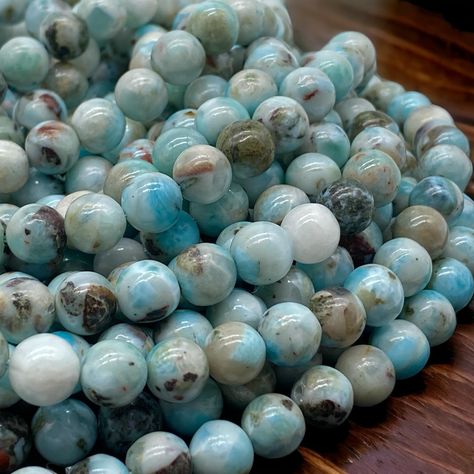 PRICES MAY VARY. Introducing our exclusive Dominican Republic Larimar with black dendritic beads - a rare and highly sought-after gemstone that is 100% natural and not color enhanced. Each package contains one strand of loose beads that measures 15.5 inches long and does not include a clasp. Our beads are of the highest quality, with consistent 1mm hole size and shape, making them perfect for all your jewelry-making needs. This unique stone is prized for its striking blue hues, often with intric Amazon Beads, Crystal Energy, Vintage Beads, Rare Gemstones, Blue Labradorite, Energy Crystals, Iron Oxide, Arts And Crafts Projects, Black Iron