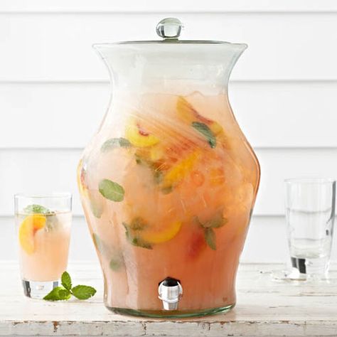 Peach-Mint Lemonade Recipe | Sur La Table Mint Lemonade Recipe, Peach Baby Shower, Peach Party, Mint Lemonade, Peach Lemonade, Summer Baby Shower, Shower Food, Lemonade Recipes, Sweet Peach