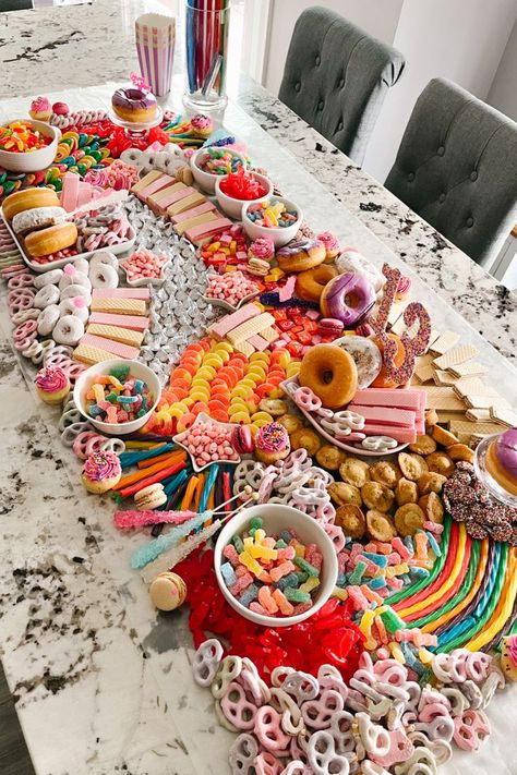 A candy table that is like a charcuterie board but made out of candy and small mini dessert items, the theme was colorful for a 13th birthday party Birthday Candy Board, Candy Charcuterie, Candy Salad, Birthday Sleepover Ideas, Board Night, Snack Boards, Candy Land Birthday, Candy Land Birthday Party, Candy Board