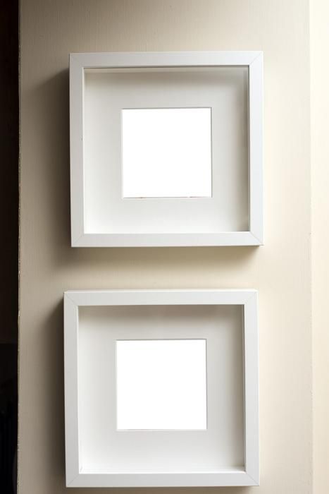 Two empty square neutral colored frames hanging together on an off white wall one below the other - free stock photo from www.freeimages.co.uk Colored Frames, Empty Picture Frames, Xxxtentacion Quotes, Framing Ideas, Off White Walls, Empty Frames, Photo Frame Design, White Frames, Kim Joon