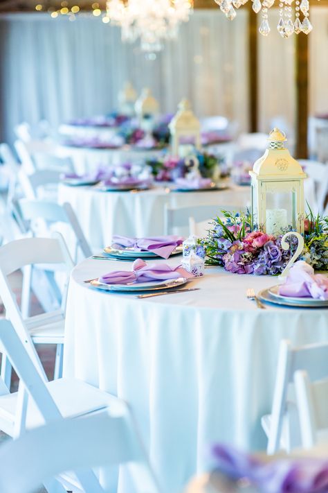 Colorful pink, blue and purple vintage inspired wedding table decor at the Carriage House Stable | Photographer: Brittany Morgan Photography | Venue: Cross Creek Ranch | #crosscreekranchfl #ccrweddings #carriagehousestable #colorfulvintagewedding #vintagewedding #colorfulwedding Pink Purple And Blue Wedding Decor, Light Blue Purple And Pink Wedding, Lavender And Light Blue Wedding Decor, Blue And Purple Table Decorations, Blue And Purple Table Setting, Blue And Purple Wedding Table Decor, Lavender Pink And Blue Wedding, Dusty Blue And Lavender Wedding Wedding Table Decor, Lilac And Blue Wedding Decor