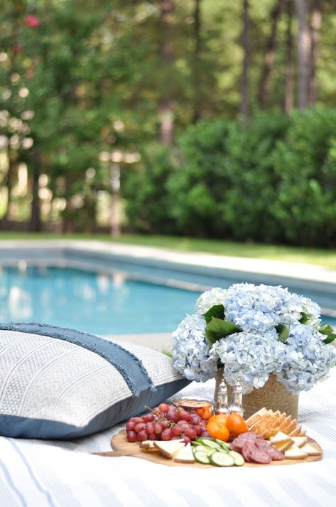 INDIAN SUMMER PICNIC BY THE POOL WITH LETTY BLU – Bungalow Blue Interiors Poolside Picnic, Entertaining Hacks, Diy Outdoor Space, Beautiful Outdoor Furniture, Crudite Platter, Pool Pillow, Seagrass Baskets, Blue Interiors, Teak Bowl