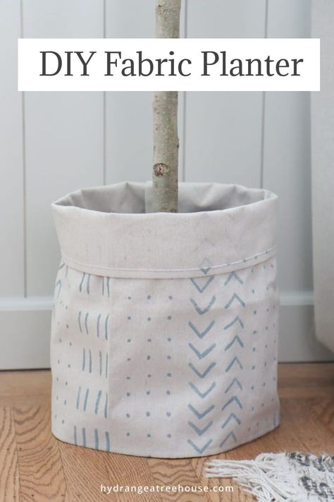 Looking for a creative and budget-friendly way to display your plants? Then this post is for you! Here's my simple DIY method to transform what you have at home into adorable fabric planters. With their unique adjustable design, you can reuse them as your plants grow and require larger pots. And the best part? You don’t need to know how to sew! In this tutorial, I’ll provide instructions for both a no-sew option and a sewing machine method, so you can choose what works best for you. Plant Pot Holders, Plant Pot Covers, Cotton Plant, Mud Kitchen, Fabric Scissors, Paint Samples, Drop Cloth, Cool Diy Projects, Easy Tutorial