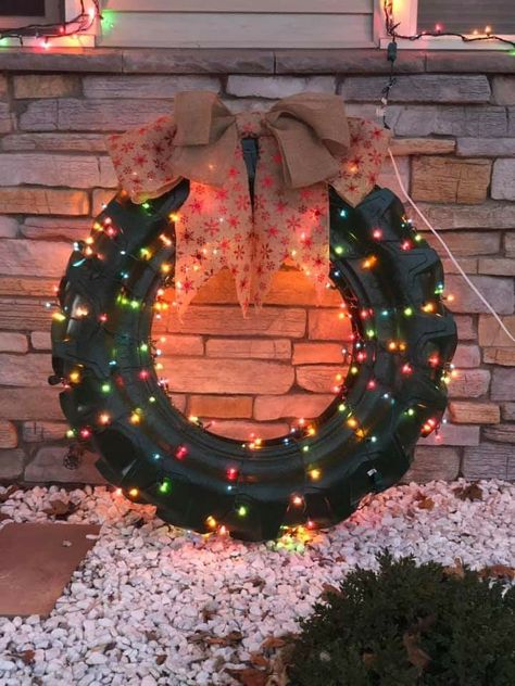 Tractor tire outdoor Christmas decor. So doing it next year! Old Tires Christmas Ideas, Tractor Tires Ideas, Tractor Tires Repurposed, Truck Tire Ideas, Tractor Tire Wreath Christmas, Tractor Tire Christmas Decoration, Tire Decor Ideas, Christmas Tires Decoration, Farm Christmas Decor Outdoor