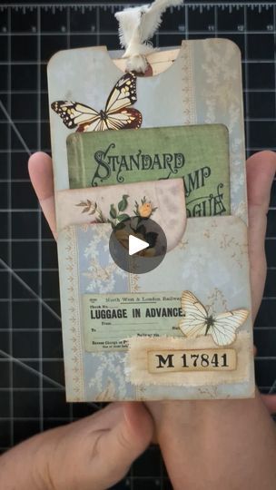 2.5K views · 908 reactions | A simple floating pocket that could be clipped to a page, glue 3 sides to make an additional pocket on a journal page, or tucked into an existing pocket of your junk journal.

I love the simplicity of this project and I also love that there is very little waste. I was inspired by @shabbydabbydoodah1

The blue paper is from a new kit in the Basic Journal Pages section in my Etsy Shop. It's called Steely blue. Don't you just love the old wallpapers? 

The butterflies are from the dollar store and the ephemera is Tim Holtz. I used vintage photo to ink the edges. 

Don't ask me where I got the large tag from. I'm sure it was from a gift shop years ago. 

Thanks for watching!

#junkjournalmaker 
#junkjournaltutorial 
#junkjournalpocket 
#beginner 
#ephemera | Raven Making Pockets For Journal, Diy Book Cover Ideas Creative Journals, Paper Pockets Diy, Basic Journal, Journal Pockets, Paper Pocket, Journal Books, Cardmaking Ideas, Journal Page