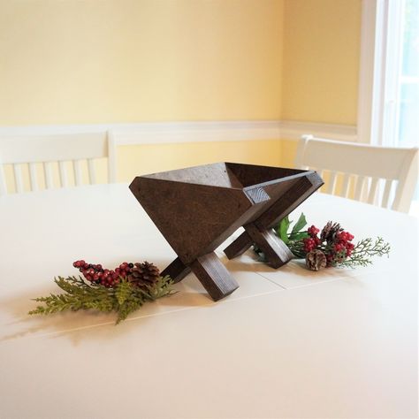 Small Christmas manger in espresso color. Overall dimensions (assembled): 8.1 in. L x 7.5 in. W x 5.8 in. H. Ships fully assembled This item is for decoration only. Not intended for use to feed animals or as an infant cradle. Decorative sprigs not included. Wood Manger Diy, Building A Manger Diy Projects, Manger Diy Wooden, Manger Scenes Nativity, Wooden Star Of Bethlehem, Wood Creche Nativity Stable, Advent Church Decorations, Grey Christmas Tree, Nativity Scene Diy