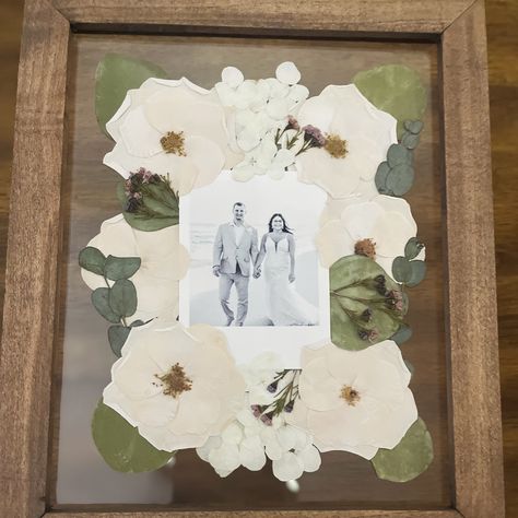 It was an honor to preserve Stephanie's elegant, all-white wedding bouquet, beautifully displayed in a 16x20 float frame. A delicate touch of lace from her wedding dress adds a personal and timeless element to the piece. As a special gift, we also created an 8x10 photo frame for her mom, offering a heartfelt keepsake from such a perfect day. Thank you, Stephanie, for entrusting me with these cherished memories. 🤍 — 16x20 medium stain float frame — 8x10 medium stain float frame with photo ... Framed Bouquet, Keepsake Display, All White Wedding, Float Frame, White Wedding Bouquets, Wedding Keepsakes, A Perfect Day, 8x10 Photo, Cherished Memories