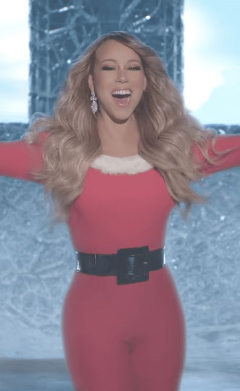 By now we all know that the holiday season doesn’t start until the Queen of Christmas herself, Mariah Carey, says so. Keeping with tradition, the pop diva officially ringed in the most wonderful time of the year with her annual “It’s Time” Christmas announcement video, which was released at midnight on Nov. 1. And this time around, Carey fully leaned into embracing all of those defrosting memes that circulate the Internet every November. Mariah Carey Now, S Curls, Christmas Announcement, Hugo Gloss, Mariah Carey Christmas, Maria Carey, Christmas Poses, Celebrity Hairstylist, S Curl