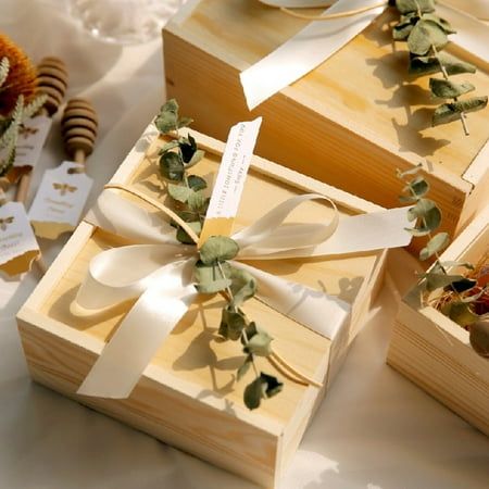 Description: This gift package box is decorated with ribbons and imitation leaves, which adds a romantic and elegant ambience, and it is perfect for wrapping wedding gifts. Sliding cover design makes this gift package box can be easily opened, and the lid does not fall off easily, preventing the gifts inside from falling off. By making with wood material, it can be used for long time. There are 4 sizes to choose from: S, M, L, XL It is great for party favors at weddings, baby showers, birthday p Gift Boxes Ideas, Nesting Gift Boxes, Let Love Grow, Bridal Boxes, Glassware Vintage, Wedding Candy Boxes, Gift Boxes With Lids, Elegant Wedding Favors, Red Gift Box