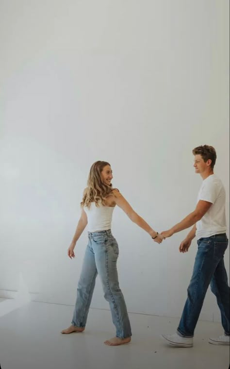 Denim And White Shirt Couple Photoshoot, White Sheet Couples Shoot, White Tshirt Photoshoot Couple, Couples Photoshoot White Shirt, Jeans And Tshirt Couple Photoshoot, Couple Sheet Photoshoot, Editorial Engagement Shoot Studio, Studio Couples Poses, Engagement Photos Outfits Studio