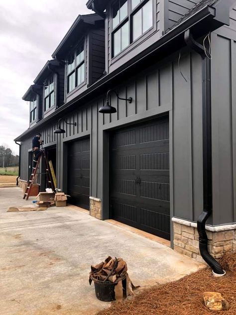 Garage Door Barndominium, Farmhouse Exterior With Garage, Black Modern Farmhouse Exterior, Garage Exterior Ideas, Dream House Garage, Black Modern Farmhouse, Barn House Ideas, Outdoor Space Ideas, Farmhouse Garage