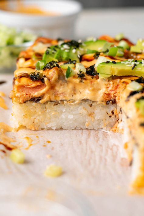 Salmon Sushi Bake | Liv Gluten-Free Baked Salmon Sushi, Salmon Sushi Bake, Gluten Free Sushi, Rice Seaweed, Spicy Salmon Sushi, Creamy Salmon, Salmon Cakes Recipe, Sushi Bake, Sushi Cake