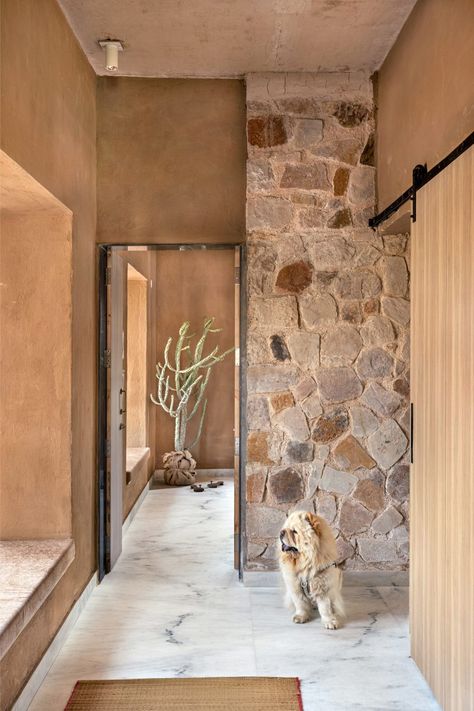 Recycled stone forms walls of Rajasthan farmhouse by Sketch Design Studio Stone Floor Interior, Floor Interior Design, Wall Sketch, Natural Stone Floor, India Architecture, Stone Interior, Stone Blocks, House Sketch, Screened In Patio