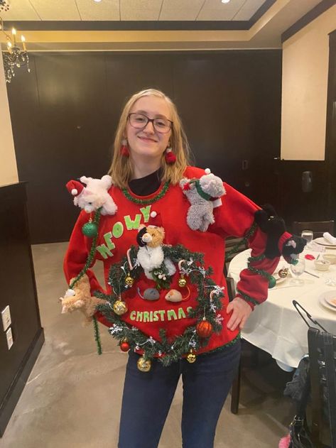 24 DIY Ugly Christmas Sweater Ideas To Recreate This Year - She Be Thriving Diy Ugly Christmas Sweater Ideas, Crazy Christmas Sweaters, Making Ugly Christmas Sweaters, Homemade Ugly Christmas Sweater, Ugly Christmas Sweater Ideas, Ugly Christmas Sweater Cat, Ugly Christmas Sweater Outfit, Christmas Sweater Ideas, Christmas Sweater Outfits