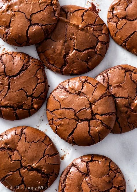 The Ultimate Chocolate Brownie Cookies - These are THE BEST (and the easiest!) chocolate brownie cookies you’ll ever make. They’re perfectly gooey, fudgy and intensely chocolatey, and you need just 7 ingredients and about half an hour to make them! Plus, they’re flourless and therefore the perfect gluten free dessert (but they’ll be a hit with absolutely everyone). Chocolate cookies. Easy cookie recipes. Gluten free cookies. Gluten free desserts. Gluten free recipes. Cookie Recipes Gluten Free, Ultimate Chocolate Brownies, The Loopy Whisk, Loopy Whisk, Cookies Sans Gluten, Gluten Free Chocolate Cookies, Cookies Cupcake, Gluten Free Dessert, Flourless Brownies